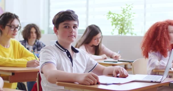 Portrait Nice Caucasian Teen Clever Schoolboy Glasses Sitting Desk Classroom — Stock Video