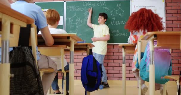 Caucasian Smart Teenager Schoolboy Answering Blackboard Woman Teacher Biology Solving — Stock Video