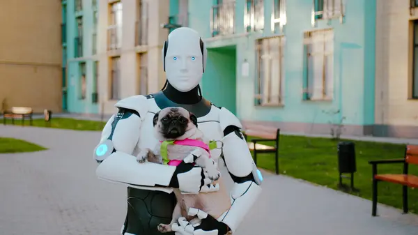 Portrait of humanoid robot with pug dog in hands posing at camera at urban area. Innovative and futuristic service facilitating human labor and helping to take care of lovely pets.