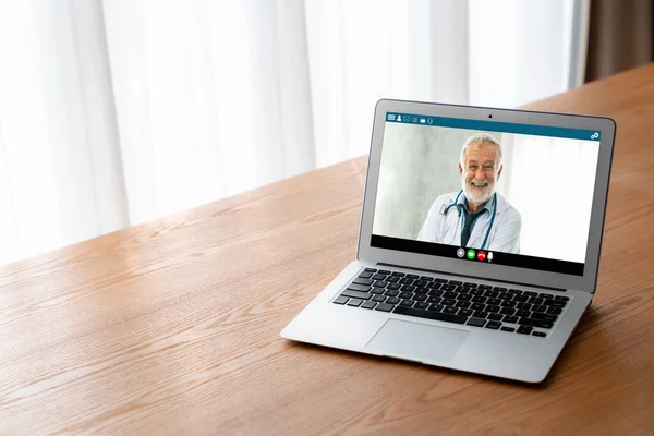 stock image Doctor video call online by modish telemedicine software application for virtual meeting with patient