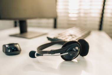 Essential equipment concept for competent online operators, call service agents, or online working. Customer service equipment, as well as helpdesk tools.