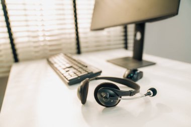 Essential equipment concept for competent online operators, call service agents, or online working. Customer service equipment, as well as helpdesk tools.