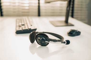 Essential equipment concept for competent online operators, call service agents, or online working. Customer service equipment, as well as helpdesk tools.