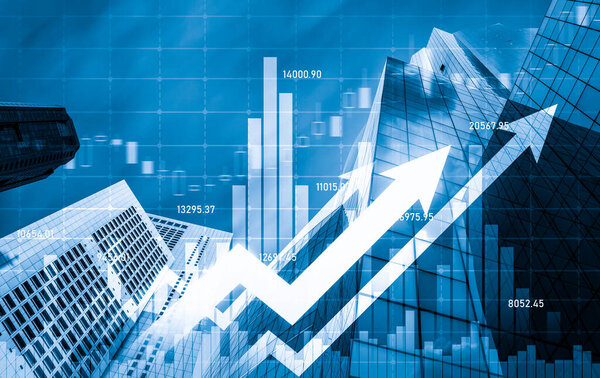 Financial graphs and digital indicators overlap with modernistic urban area, skyscrabber for stock market business concept. Double exposure.