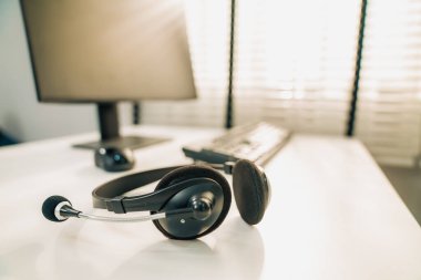 Essential equipment concept for competent online operators, call service agents, or online working. Customer service equipment, as well as helpdesk tools.