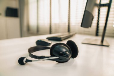 Essential equipment concept for competent online operators, call service agents, or online working. Customer service equipment, as well as helpdesk tools.