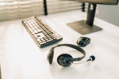 Essential equipment concept for competent online operators, call service agents, or online working. Customer service equipment, as well as helpdesk tools.