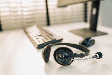 Essential equipment concept for competent online operators, call service agents, or online working. Customer service equipment, as well as helpdesk tools.