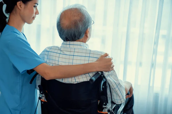 Rear View Caregiver Her Contented Senior Patient Gazing Out Window — Foto de Stock