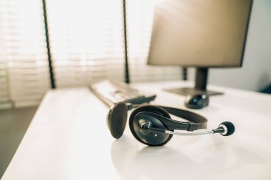 Essential equipment concept for competent online operators, call service agents, or online working. Customer service equipment, as well as helpdesk tools.