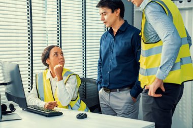 Competent engineers create blueprints and plans and present them to their boss. Architectural investors working with engineers for engineering project.