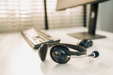 Essential equipment concept for competent online operators, call service agents, or online working. Customer service equipment, as well as helpdesk tools.