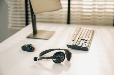 Essential equipment concept for competent online operators, call service agents, or online working. Customer service equipment, as well as helpdesk tools.