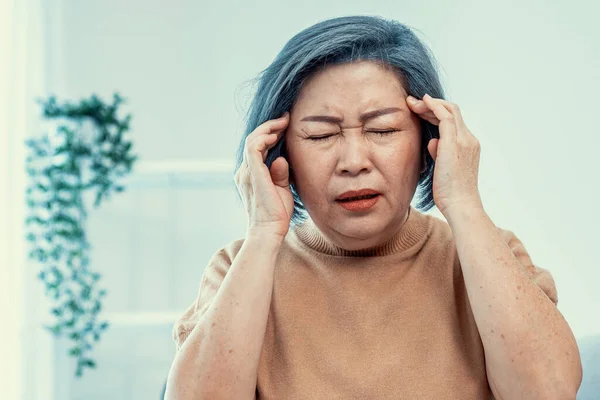 Agonizing Senior Woman Headache Compress Her Temple Both Hands Her — Stockfoto