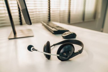 Essential equipment concept for competent online operators, call service agents, or online working. Customer service equipment, as well as helpdesk tools.