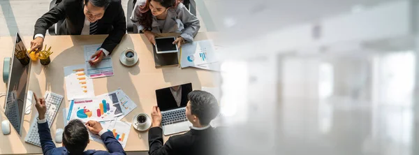 stock image Business people group meeting shot from top widen view in office . Profession businesswomen, businessmen and office workers working in team conference with project planning document on meeting table .