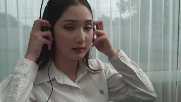 Young Enthusiastic Female Operator Put Headphone Looked Camera Start Working — Stock Video