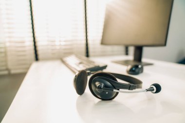 Essential equipment concept for competent online operators, call service agents, or online working. Customer service equipment, as well as helpdesk tools.