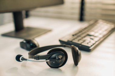 Essential equipment concept for competent online operators, call service agents, or online working. Customer service equipment, as well as helpdesk tools.