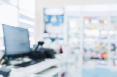 Eczane soyut arka planı bulanıklaştırmış kaliteli ilaç, raflarda tıbbi ürün. Sağlık hizmetleri konsepti için raflarda sergilenen eczane içi ilaçların bulanık ışık tonlu duvar kağıdı.