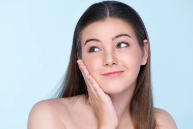 Portrait of young brunette with long hair and flawless skin with hand gesture for beauty and cosmetic concept. charming beautiful young girl posing hands for skincare or cosmetic advertising.