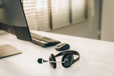 Essential equipment concept for competent online operators, call service agents, or online working. Customer service equipment, as well as helpdesk tools.