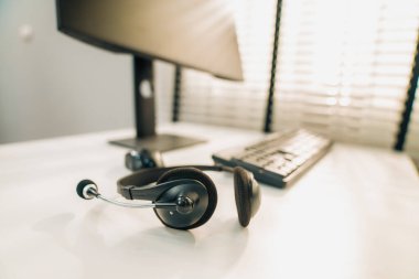 Essential equipment concept for competent online operators, call service agents, or online working. Customer service equipment, as well as helpdesk tools.