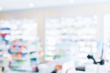 Eczane soyut arka planı bulanıklaştırmış kaliteli ilaç, raflarda tıbbi ürün. Sağlık hizmetleri konsepti için raflarda sergilenen eczane içi ilaçların bulanık ışık tonlu duvar kağıdı.