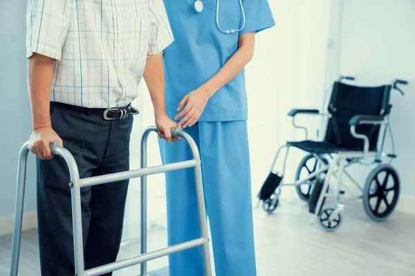 Physiotherapist Assists Her Contented Senior Patient Folding Walker Recuperation Elderly — Foto de Stock