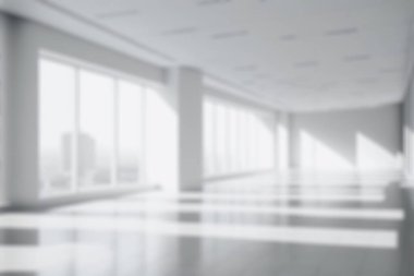 Blur background of empty modern office background . Workspace interior design white color . Clean and bright office gallery background