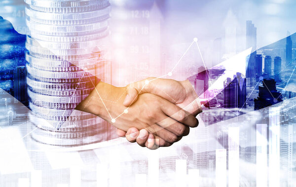 Business handshake on finance prosperity and money technology asset background . Economy and financial growth by investment in valuable stock market to gain wealth profit form currency trading