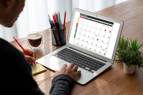 stock image Calendar on computer software application for modish schedule planning for personal organizer and online business