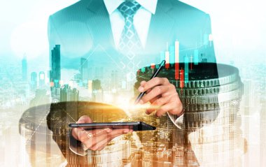 Businessman analyst working with digital finance business data graph showing technology of investment strategy for perceptive financial business decision. Digital economic analysis technology concept.