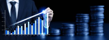 Businessman analyst working with digital finance business data graph showing technology of investment strategy for perceptive financial business decision. Digital economic analysis technology concept.