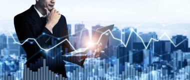 Businessman analyst working with digital finance business data graph showing technology of investment strategy for perceptive financial business decision. Digital economic analysis technology concept.
