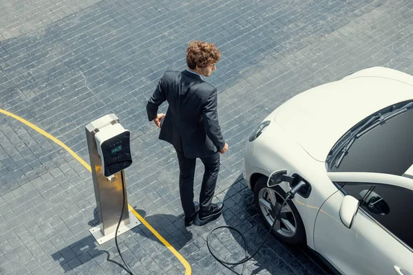 Aerial View Progressive Businessman Black Formal Suit His Electric Vehicle — Fotografia de Stock