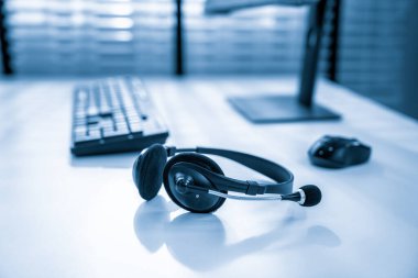 Essential equipment concept for competent online operators, call service agents, or online working. Customer service equipment, as well as helpdesk tools.