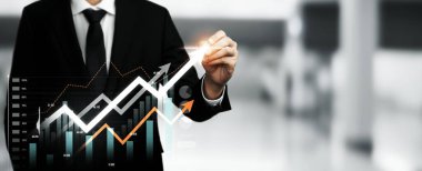 Businessman analyst working with digital finance business data graph showing technology of investment strategy for perceptive financial business decision. Digital economic analysis technology concept.