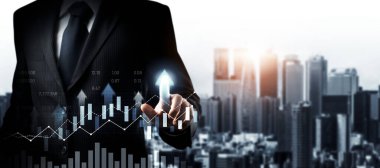 Businessman analyst working with digital finance business data graph showing technology of investment strategy for perceptive financial business decision. Digital economic analysis technology concept.