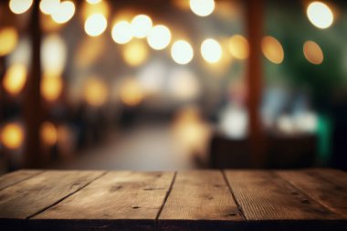 Empty wood table for product display in blur background of admirable restaurant at night