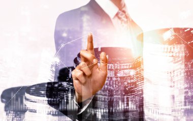 Businessman analyst working with digital finance business data graph showing technology of investment strategy for perceptive financial business decision. Digital economic analysis technology concept.