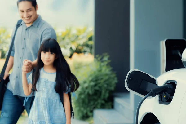 Focus Electric Car Recharging Home Charging Station Blurred Father Daughter — Photo