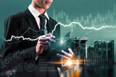 Businessman analyst working with digital finance business data graph showing technology of investment strategy for perceptive financial business decision. Digital economic analysis technology concept.