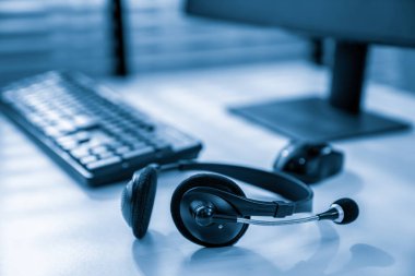 Essential equipment concept for competent online operators, call service agents, or online working. Customer service equipment, as well as helpdesk tools.