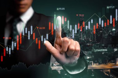 Businessman analyst working with digital finance business data graph showing technology of investment strategy for perceptive financial business decision. Digital economic analysis technology concept.