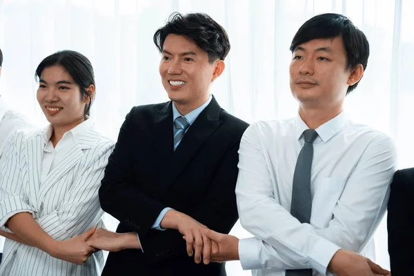 Cohesive Group Businesspeople Standing Row Holding Hand Line Together Meeting — 图库照片