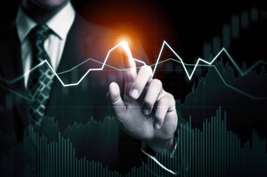 Businessman analyst working with digital finance business data graph showing technology of investment strategy for perceptive financial business decision. Digital economic analysis technology concept.