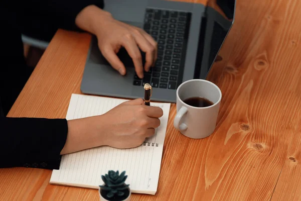 Closeup Hand Secretary Writing Notebook Laptop Coffee Her Desk Harmony — Foto de Stock