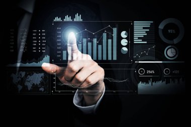 Businessman analyst working with digital finance business data graph showing technology of investment strategy for perceptive financial business decision. Digital economic analysis technology concept.
