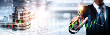 Businessman analyst working with digital finance business data graph showing technology of investment strategy for perceptive financial business decision. Digital economic analysis technology concept.